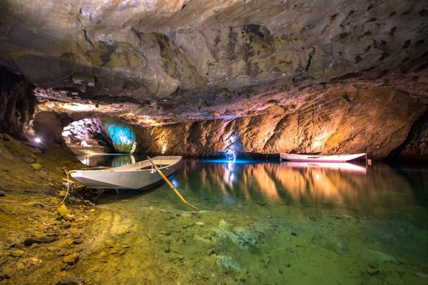 Underground lake with an empty boat